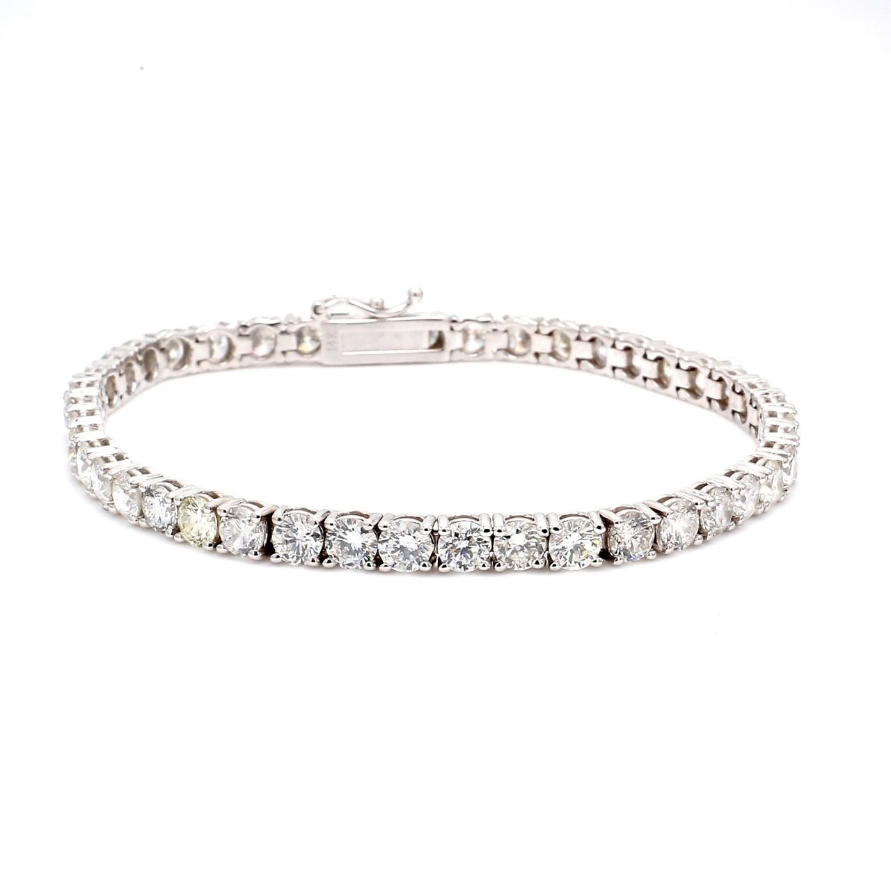 7' Tennis bracelet in 18K WG with 4-prong set (42) round diamonds.  D11.52ct.t.w.