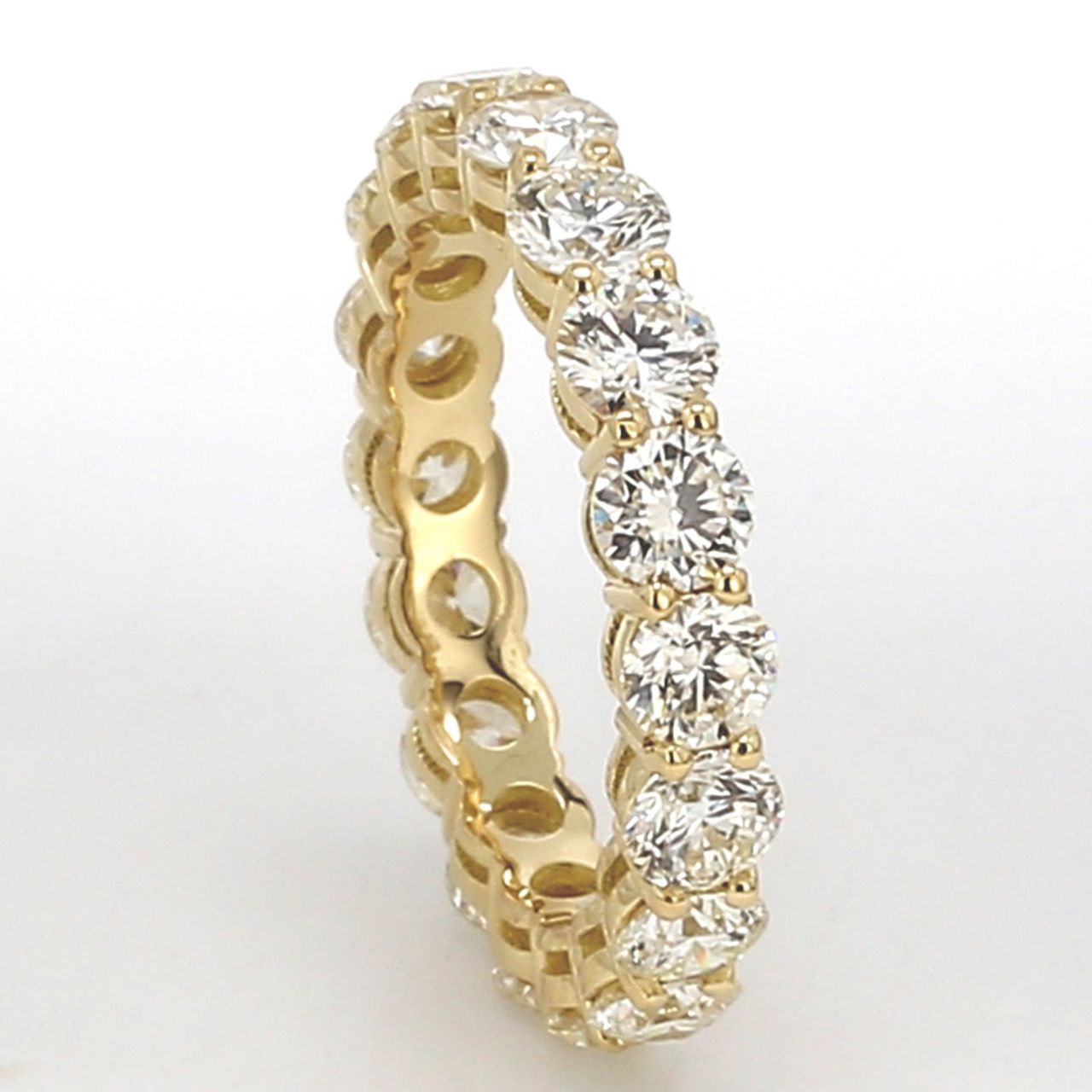 Eternity band in 18K YG with basket prong set (18) round diamonds.  D3.44ct.t.w.  Size 6