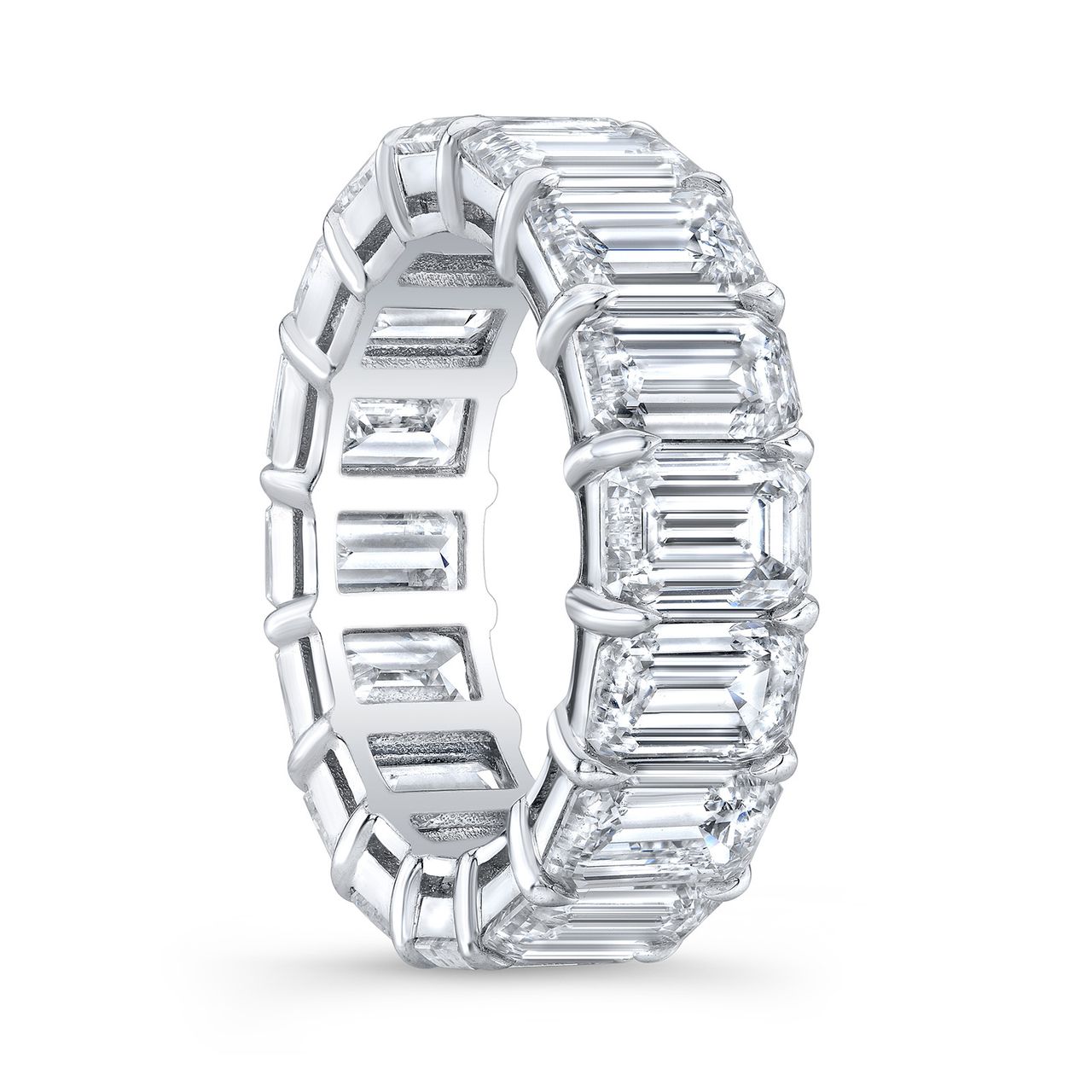 Eternity band in platinum with shared prong set (23) emerald cut diamonds.  D3.88ct.t.w.  Size 5.25