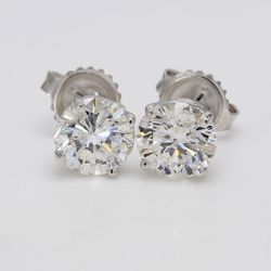 Push back stud earrings with 4-prong set USA certified F/SI3-I1 round diamonds.  D2.51ct.t.w.
