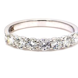7-stone band in 18K WG with prong set round diamonds.  D0.84ct.t.w.  Size 7