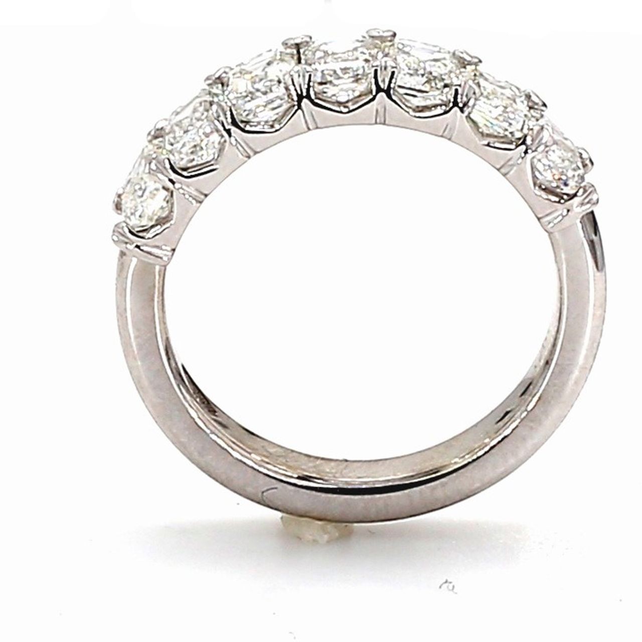 7-stone band in platinum with prong set emerald cut diamonds.  D2.15ct.t.w.  Size 5.25