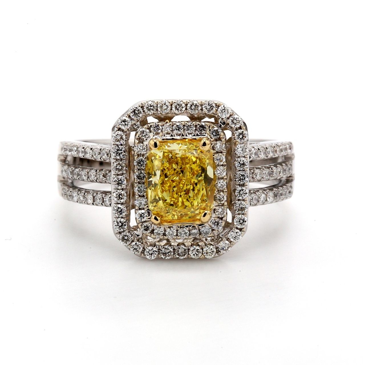 Double halo triple shank ring in 18K WG with 4-prong set GIA certified FVY/SI2 radiant cut center & french pave set round diamonds.  D1.53ct.t.w.  (Center 1.09ct.)  Size 6.25