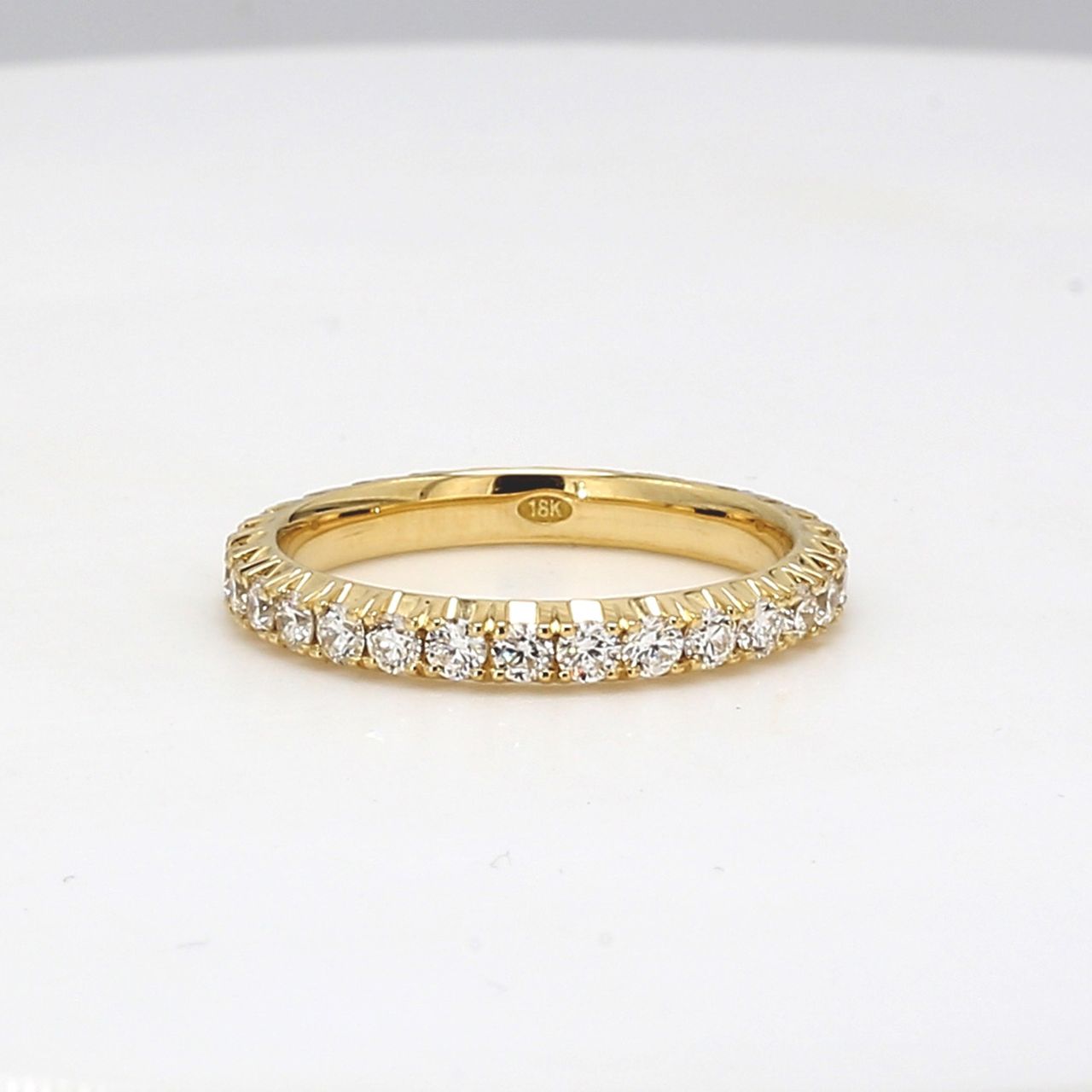Eternity band in 18K YG with 4-prong basket set round diamonds.  D1.11ct.t.w.  Size 7