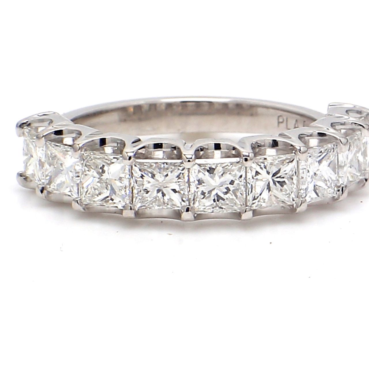 9-stone band in platinum with U-prong set princess cut diamonds.  D1.94ct.t.w.  Size 5.5