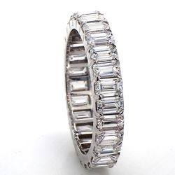 Eternity band with prong set (27) emerald cut diamonds.  D2.45ct.t.w.  Size 4.75