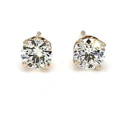 Push back stud earrings in yellow gold with prong set round diamonds.  D0.85ct.t.w.