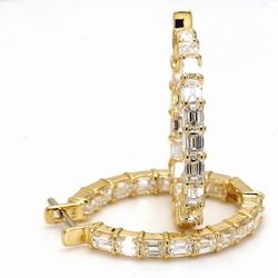 1.25' Oval shaped inside out earrings in 18K YG with prong set (32) emerald cut diamonds.  D6.03ct.t.w.