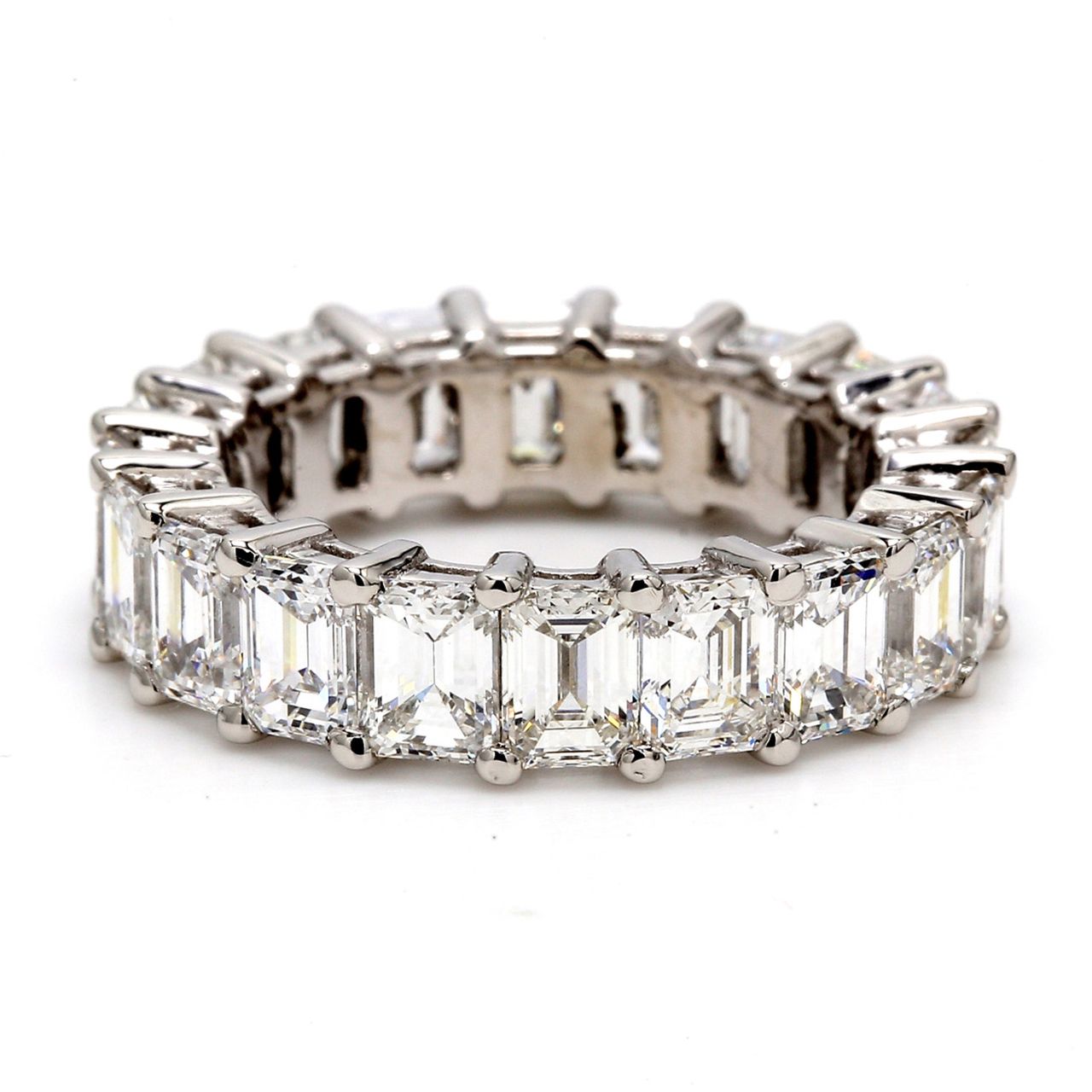 Eternity band in platinum with shared prong set (19) emerald cut diamonds.  D5.84ct.t.w.  Size 5