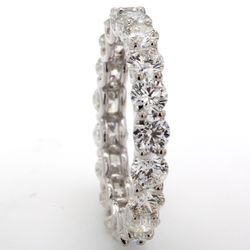 Eternity band in 18K WG with U-prong set (19) round diamonds.  D2.56ct.t.w.  Size 5.25