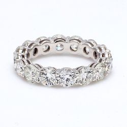 Eternity band with shared prong set round diamonds.  D5.26ct.t.w.
