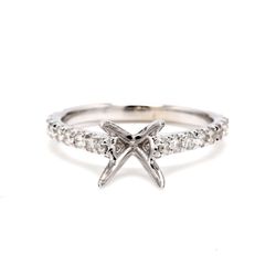 Semi-mount with U-prong set round diamonds.  D0.47ct.t.w.  Size 6