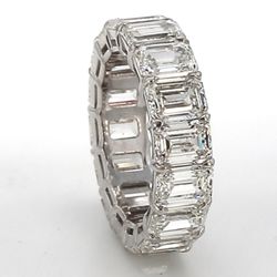 Eternity band in platinum with basket prong set GIA certified G-I/VVS-VS (16) emerald cut diamonds.  D8.12ct.t.w.  Size 4.75
