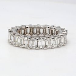 Eternity band with shared U-prong set (22) emerald cut diamonds.  D3.74ct.t.w.  Size 5