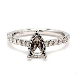 Semi-mount with prong set round diamonds.  D0.36ct.t.w.