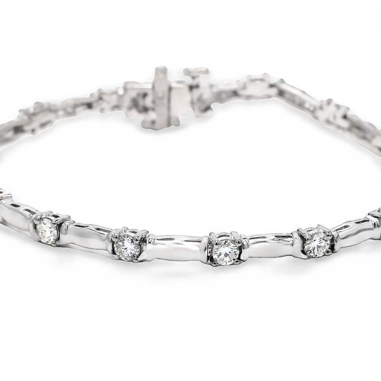 7' Link bracelet with prong set (15) round diamonds.  D1.80ct.t.w.