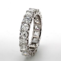 Eternity band in platinum with shared U-prong set (19) asscher cut diamonds.  D3.89ct.t.w.  Size 5