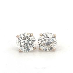 Push back stud earrings in yellow gold with 4-prong set round diamonds.  D2.02ct.t.w.
