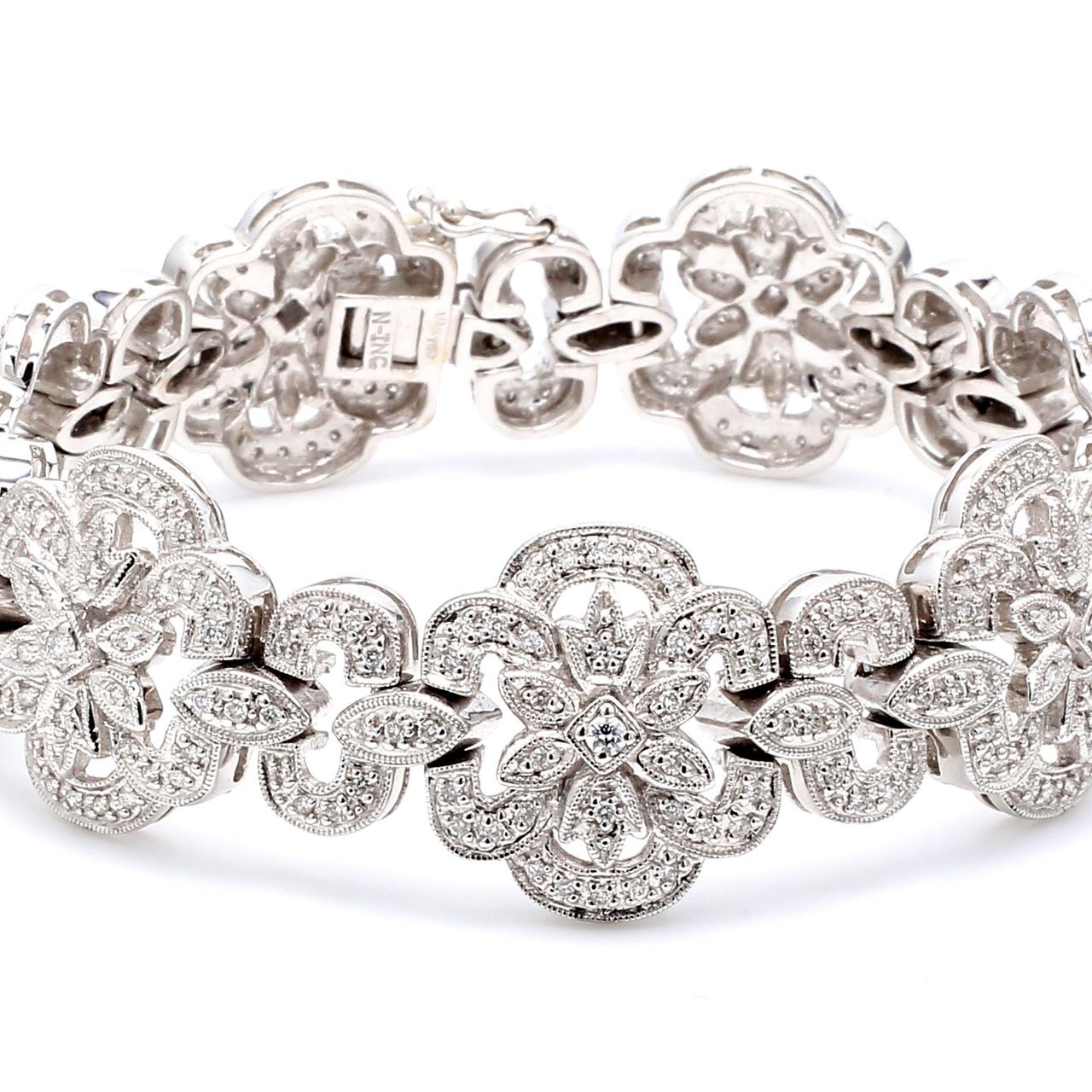 7' Flower design antique bracelet in 18K WG with round diamonds.  D1.89ct.t.w.