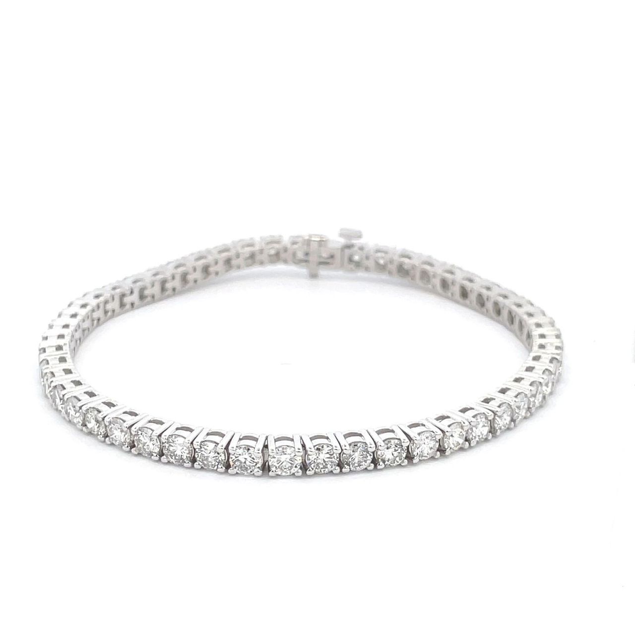 7' Tennis bracelet with basket prong set (73) round diamonds.  D2.83ct.t.w.
