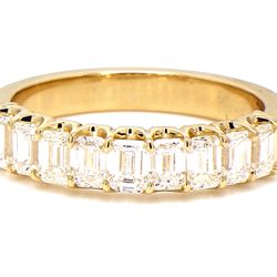 9-stone band in yellow gold with U-prong set emerald cut diamonds.  D2.16ct.t.w.