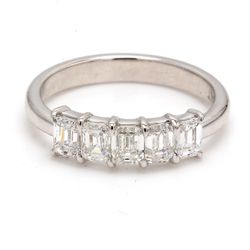 5-stone band in platinum with prong set emerald cut diamonds.  D1.15ct.t.w.  Size 5.75
