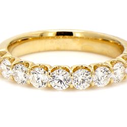 9-stone band in 18K YG with U-prong set round diamonds.  D0.95ct.t.w.