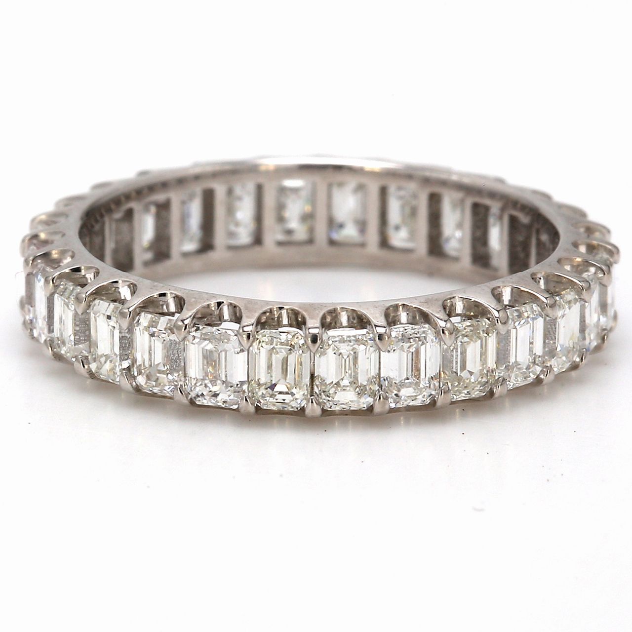 Eternity band in 18K WG with U-prong set (28) emerald cut diamonds.  D2.45ct.t.w.  Size 6