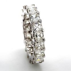 Eternity band with U-prong set (19) asscher cut diamonds.  D5.11ct.t.w.  Size 6.75