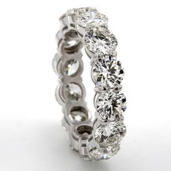 Eternity band in platinum with basket claw prong set (14) round diamonds.  D6.52ct.t.w.  Size 7