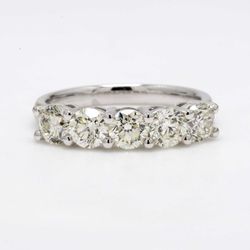 5 stone band with shared prong set round diamonds.  D1.87ct.t.w.  Size 6.75