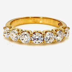 7-stone band in 18K YG with prong set round diamonds.  D1.44ct.t.w.  Size 6.5