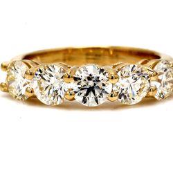 5-stone band in yellow gold with basket prong set round diamonds.  D2.85ct.t.w.  Size 8.5