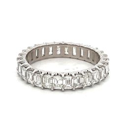 Eternity band in platinum with prong set (28) emerald cut diamonds.  D2.43ct.t.w.  Size 5.75