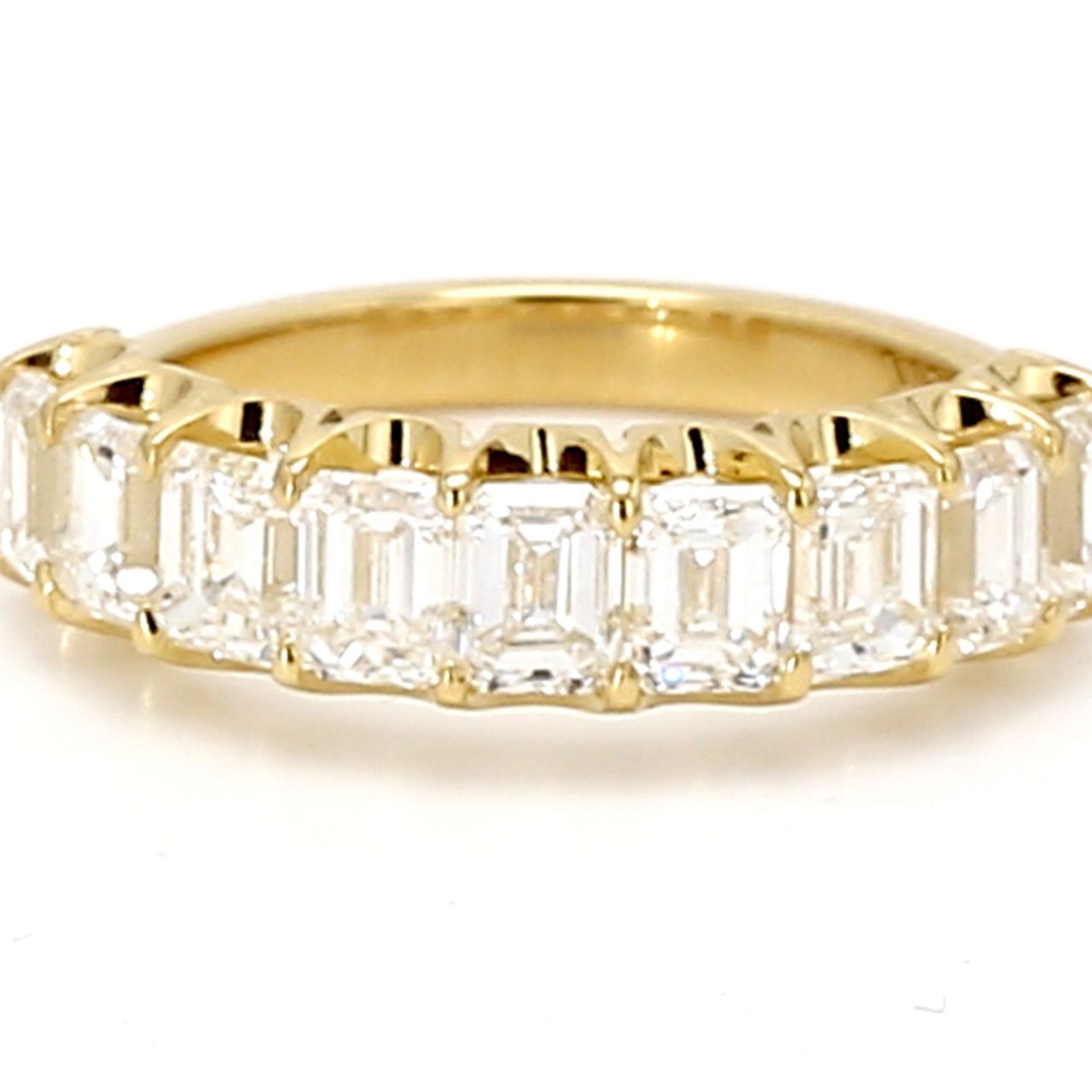 9-stone band in 18K YG with prong set emerald cut diamonds.  D2.14ct.t.w.  Size 5