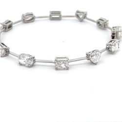 7' Multi-shape bracelet in platinum with prong set mixed shape diamonds.  D8.64ct.t.w.