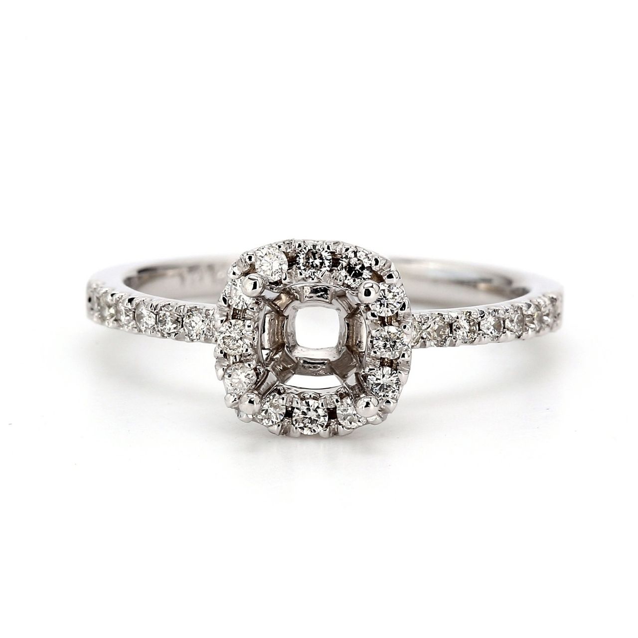 Halo semi-mount with pre-set round diamonds.  D0.30ct.t.w.  Size 6.25