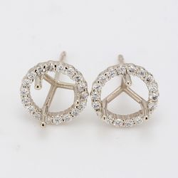 Halo semi-mount stud earrings with shared prong set round diamonds to fit 7.5mm round center.  D0.44ct.t.w.