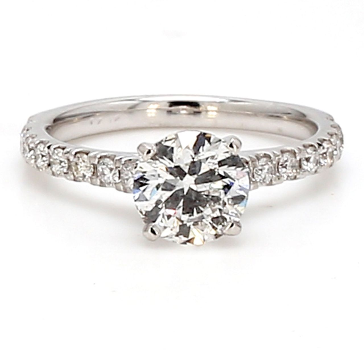 Ring in white gold with prong set rounds on shank and USA certified G/SI2 round diamond center.  D1.40ct.t.w.  (Center - 1.00ct.) Size 4