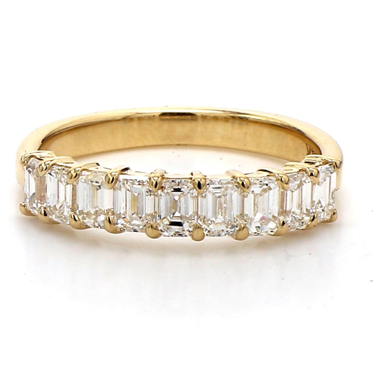 9-stone band in 14K YG with prong set emerald cut diamonds.  D1.31ct.t.w.  Size 6.5