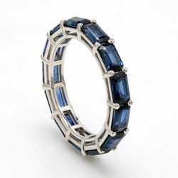 Eternity band in platinum with shared prong set sapphire.  Sapphires 4.14ct.t.w.