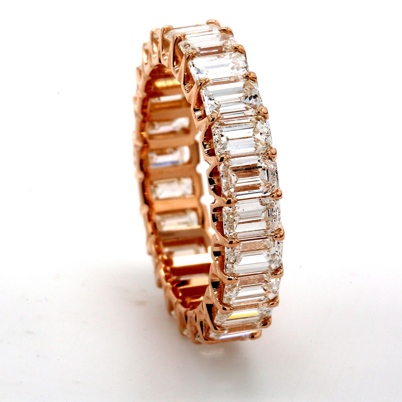 Eternity band in 18K RG with U-shape (24) emerald cut diamonds.  D4.44ct.t.w.  Size 5.75