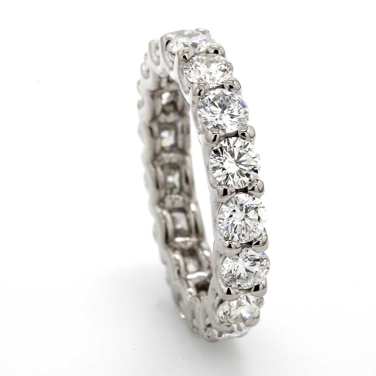 Eternity band with shared U-prong set (20) round diamonds.  D2.69ct.t.w.  Size 6.25