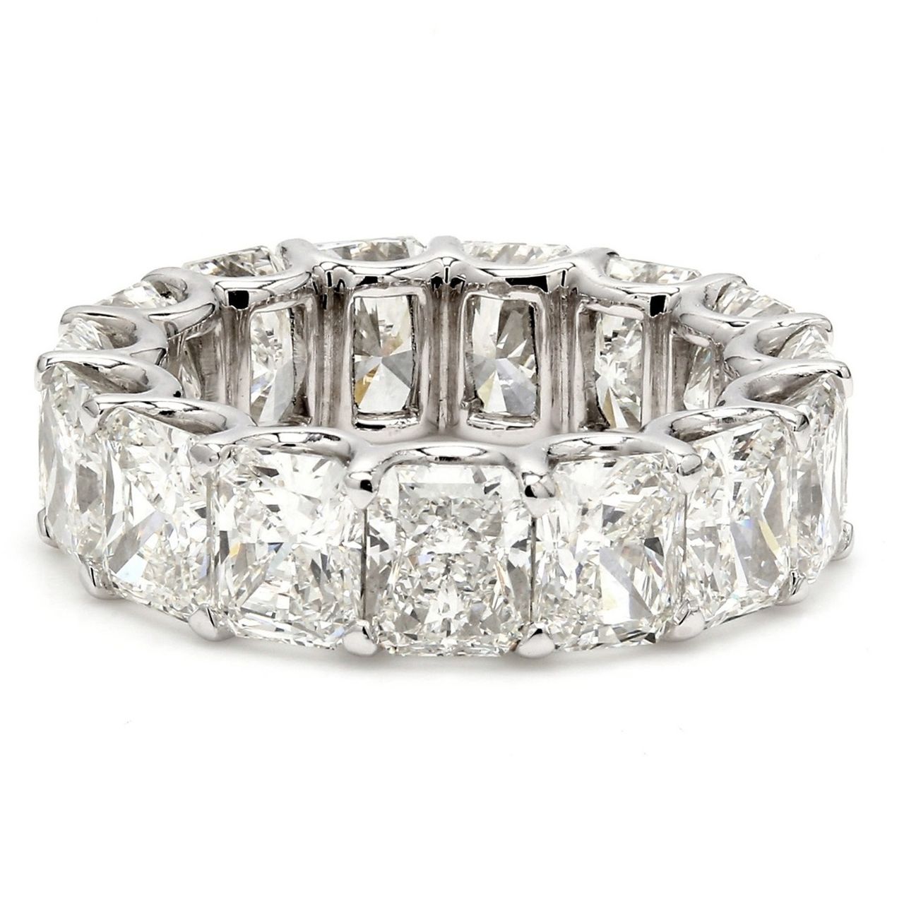 Eternity band in platinum with shared claw 4-prong set (17) radiant cut diamonds.  D7.10ct.t.w.  Size 5.75