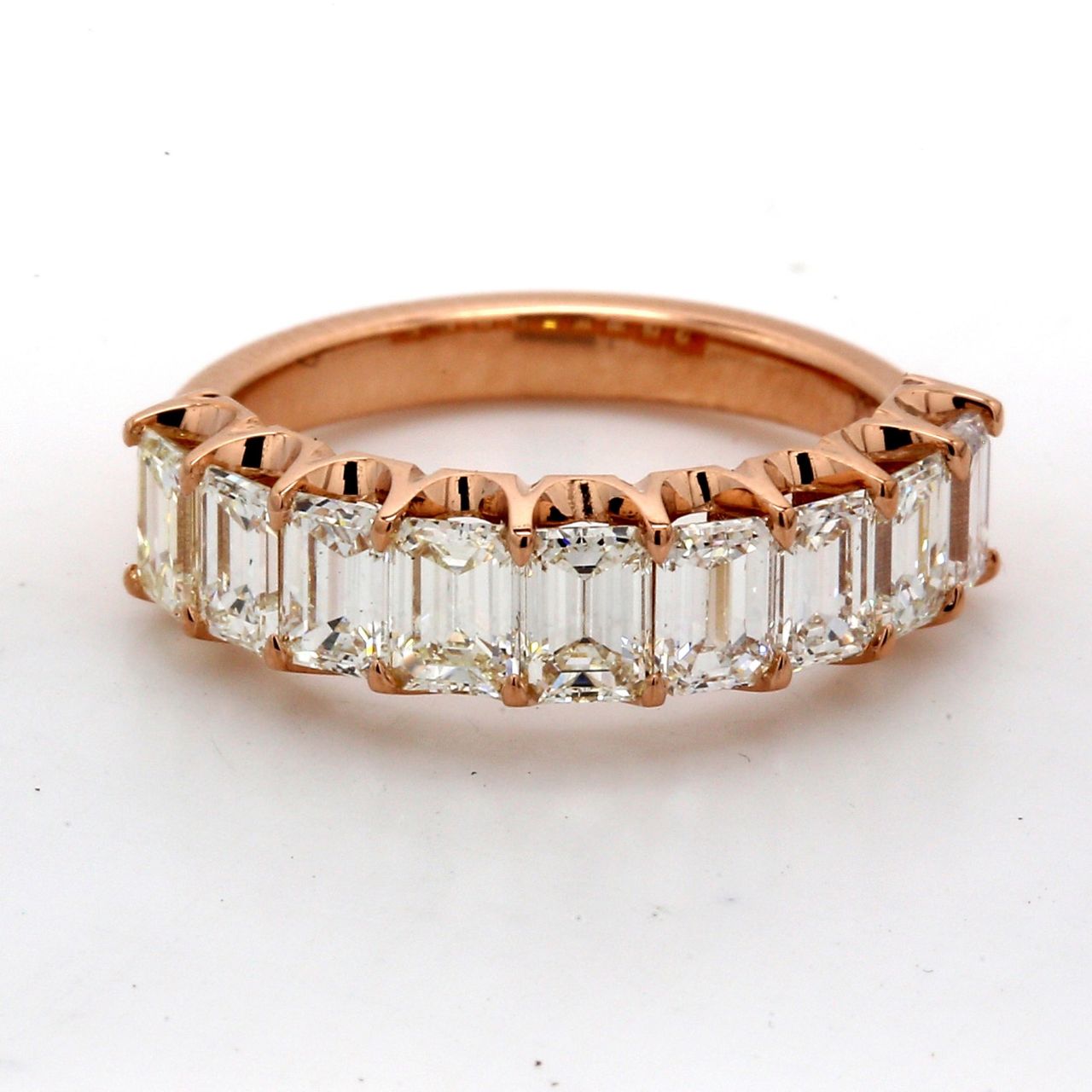 9-stone band in 18K RG with U-prong set emerald cut diamonds.  D1.99ct.t.w.  Size 5