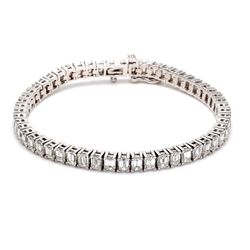 7' Tennis bracelet with 4-prong set emerald cut diamonds.  D12.99ct.t.w.