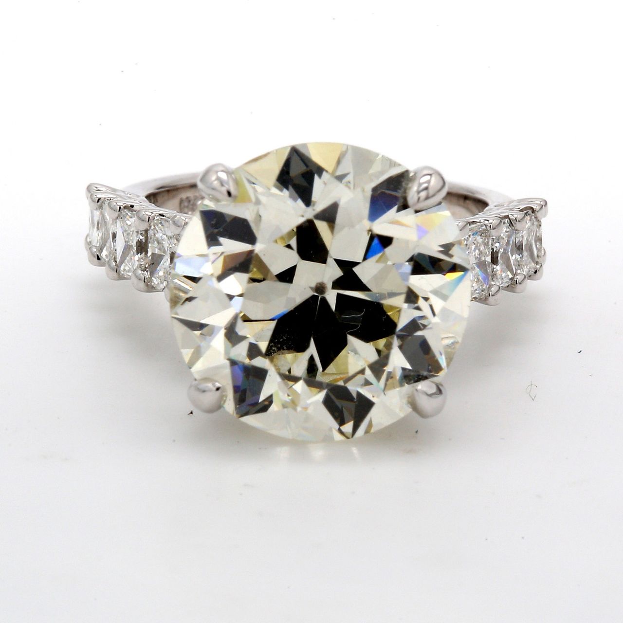 Semi-mount in 18K WG shared U-prong set radiant cuts & pave set round diamonds.  D2.00ct.t.w.