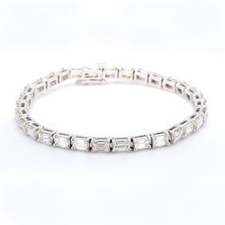 7' East to west style tennis bracelet with 4-prong set (31) emerald cut diamonds.  D8.24ct.t.w.
