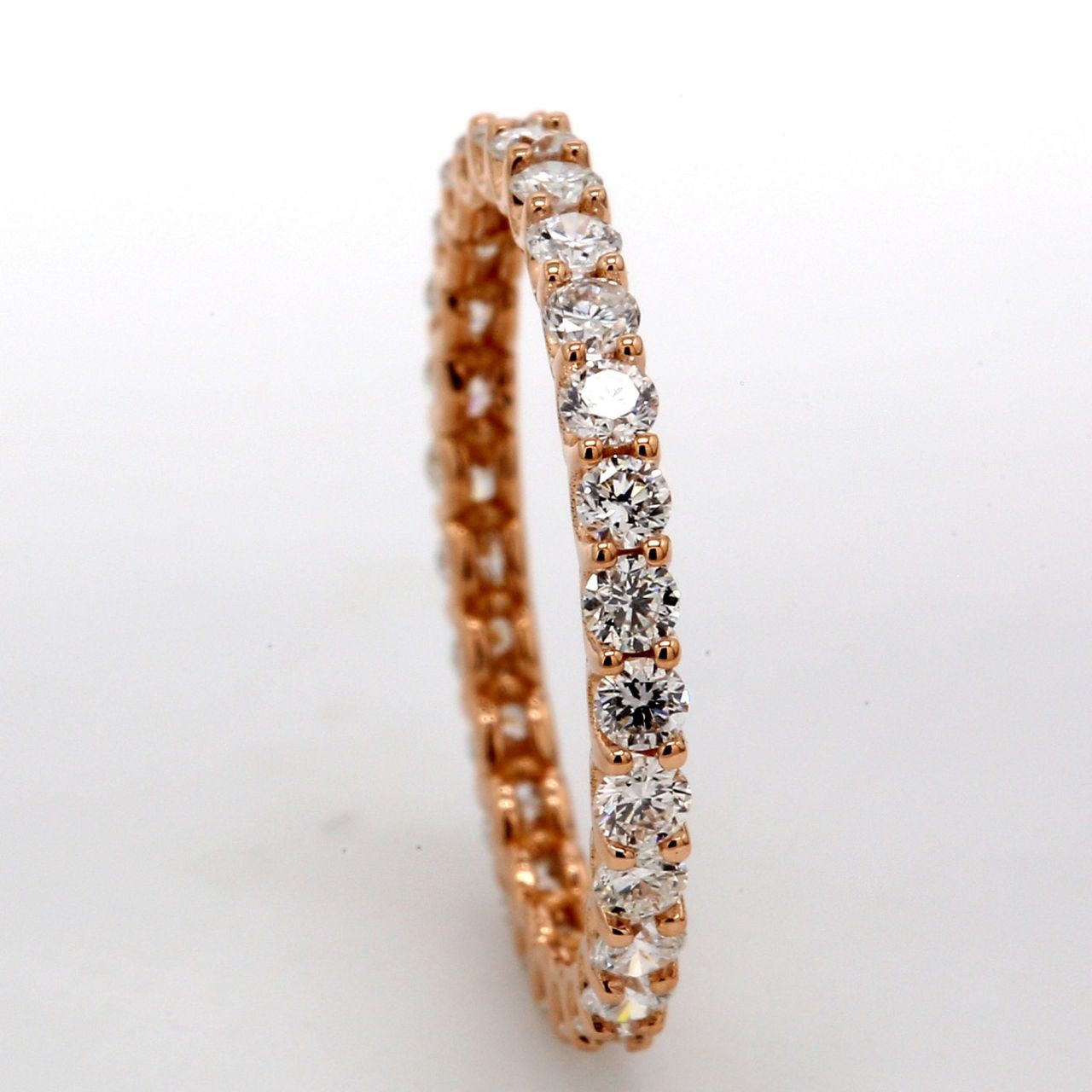 Eternity band in 14K RG with U-prong set (28) round diamonds.  D0.83ct.t.w.  Size 4.75