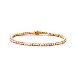 7' Tennis bracelet in 14K YG with crown set (76) round diamonds.  D2.41ct.t.w.